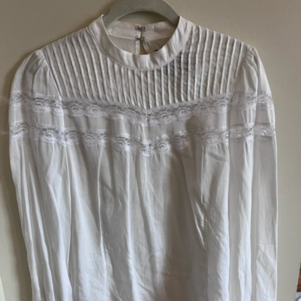 Reformation white mock neck blouse with lace details